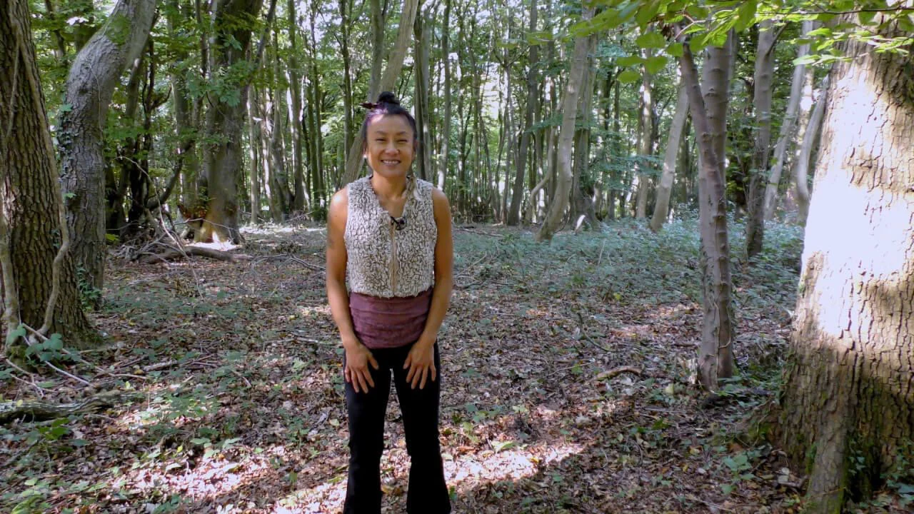 Helene Su of Niio Dance standing outside in the Woods